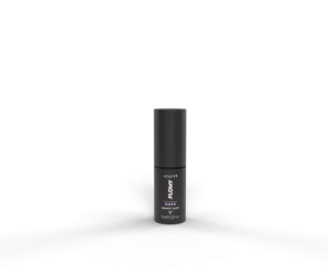 Black cylindrical bottle standing upright on a dark stage with a white label reading FLOW and small text below it, against a black background when viewed at a product shot angle.