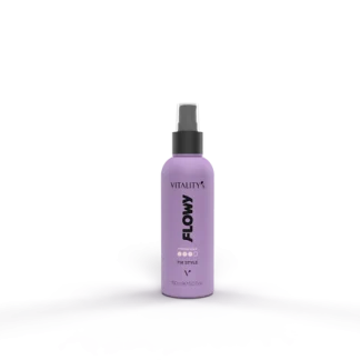 Purple spray bottle labeled FLOWY Vitality standing on a purple surface, with a gray rectangular device in the background.