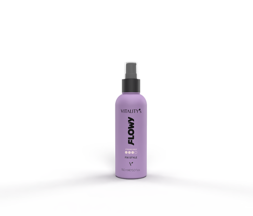 Purple spray bottle labeled FLOWY Vitality standing on a purple surface, with a gray rectangular device in the background.