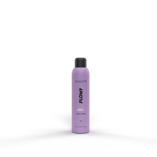 Purple handheld spray bottle labeled FLOW by Vitality’s stands upright on a purple surface with a pale purple backdrop (product photo).