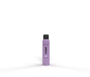 Lavender spray bottle labeled FLOW standing on a purple-lit surface against a dark background.