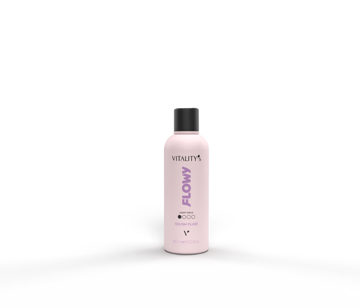 Pink bottle labeled 'Flowy' on a glossy reflective surface with a pale pink background behind it.