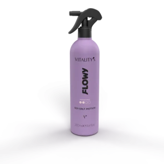 Purple spray bottle labeled FLOW from Vitality's Sea Salt Motion, with a black trigger sprayer, centered over lavender mist.