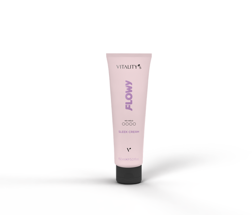 Tube of Vitality's Flowy Sleek Cream, pink container standing upright on a light surface with a soft shadow.