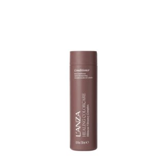 Brown conditioner bottle labeled 'Conditioner' and 'IANA Healing Colourcare' standing upright on white background.