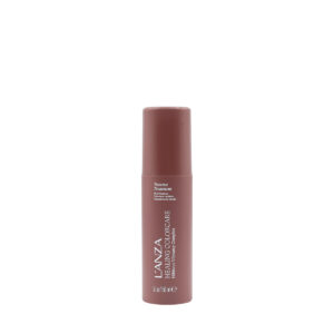 Brown cylindrical lip product container standing upright on a white background.