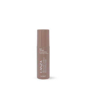 Brown cylindrical makeup bottle with cap, standing upright (likely foundation or concealer).