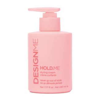 Pink DESIGNME HOLD.ME styling cream bottle with pump, front text visible: 'DESIGNME HOLD.ME styling cream' (net 7.77 fl oz / 230 ml)