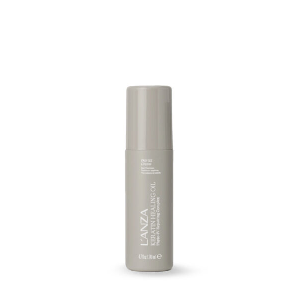 Keratin Healing Oil spray bottle by Lanza with beige cap, front-facing label visible (haircare product)