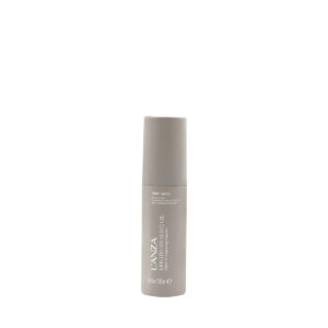 Beige concealer bottle with a light gray cap standing upright on a white background, makeup product.