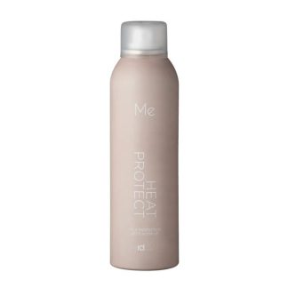 Beige hair heat-protection spray bottle with a silver cap and white text reading 'Me Heat Protect'