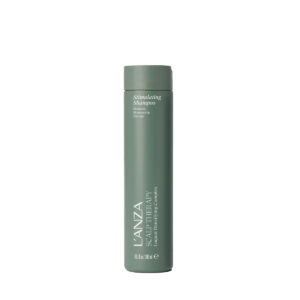 Green cylindrical bottle of L'ANZA Healing Nourishing Shampoo standing upright.