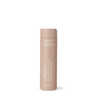 Pink L'ANZA Healing Volume Conditioner bottle with white text, standing upright on a white background (8.5 oz / 250 ml).