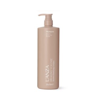 Tall pink LANZA Healing Volume Shampoo bottle with pump, labeled Shampoo and Bamboo Bodifying Complex (Bamboo Bodifying Complex)