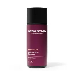 Purple Sebastian Professional bottle with black cap, labeled Penetrate Rescue Repair Shampoo, standing upright (shampoo bottle).